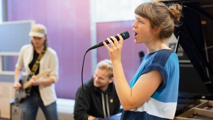 student som sjunger