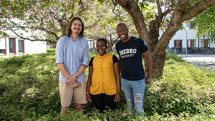 Three students at campus.