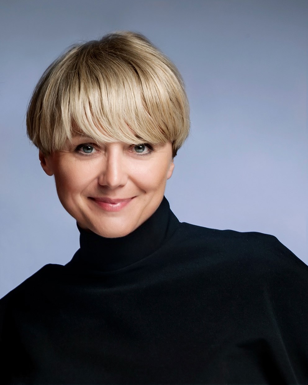 Michela Magas ler mot kameran.