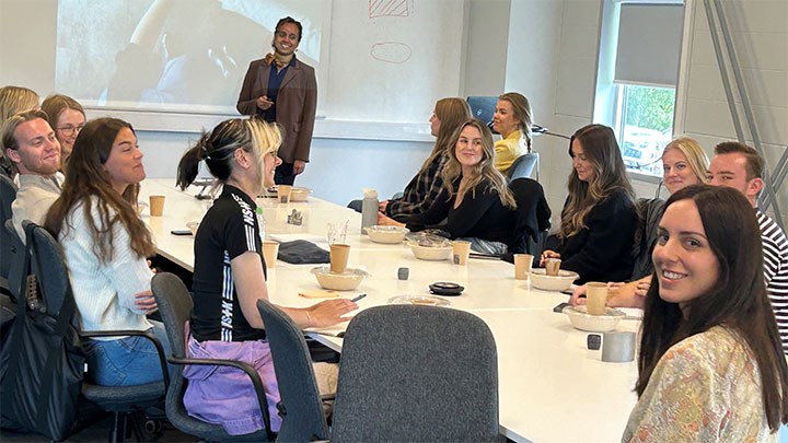 Students in a conference room.