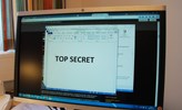 En dataskärm med texten Top secret.