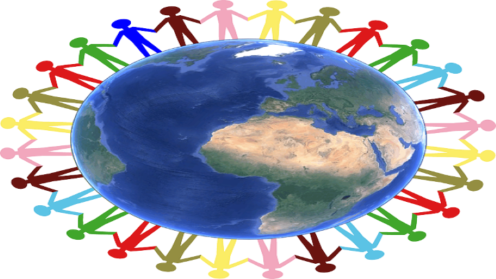 the earth with people holding hands around it